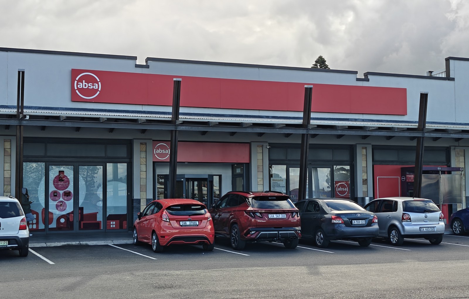 An Absa commercial branch in South Africa, marking the commercial banking sector's shift toward regulated digital asset custody and tokenized finance. Photo: Husskeyy / Wikimedia Commons