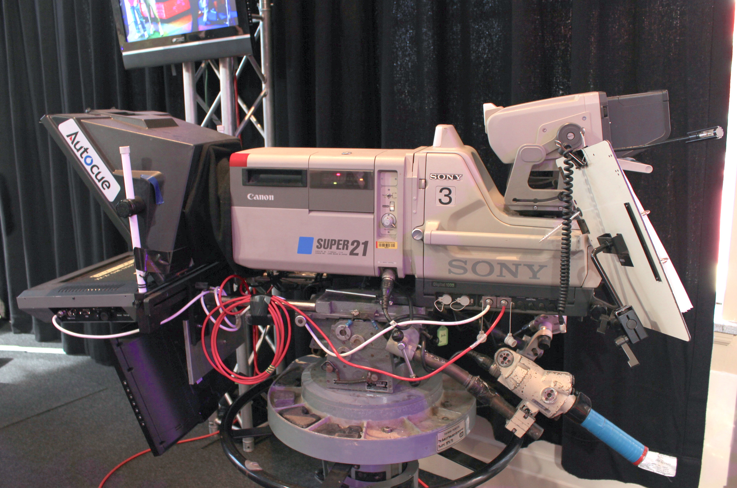 Professional broadcast studio pedestal camera with teleprompter used in high-volume television drama and news operations.